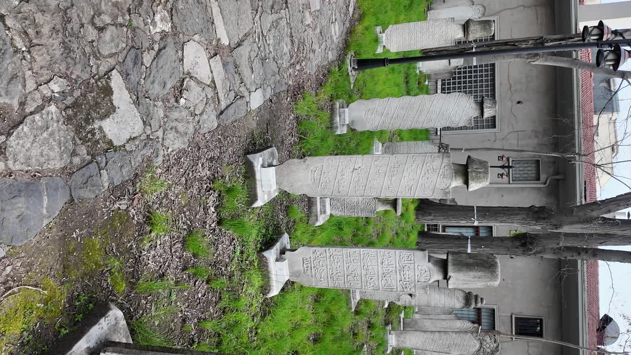 Graveyard with tombstones and stone path