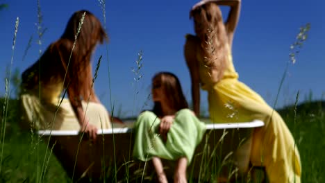 summer in a bathtub with girls.