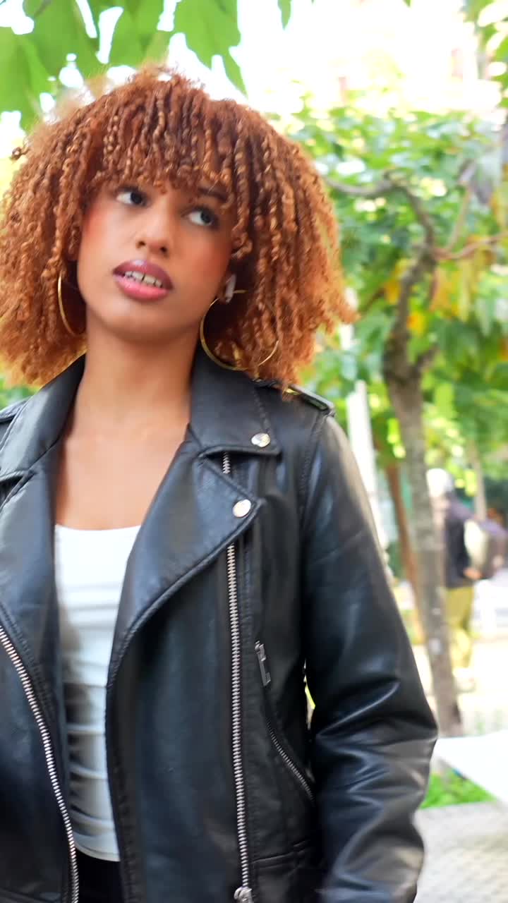 Stylish woman in a leather jacket