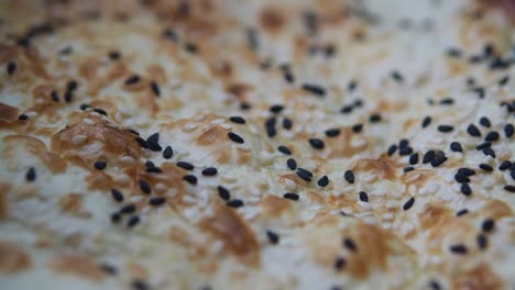 close-up of flatbread with sesame seeds