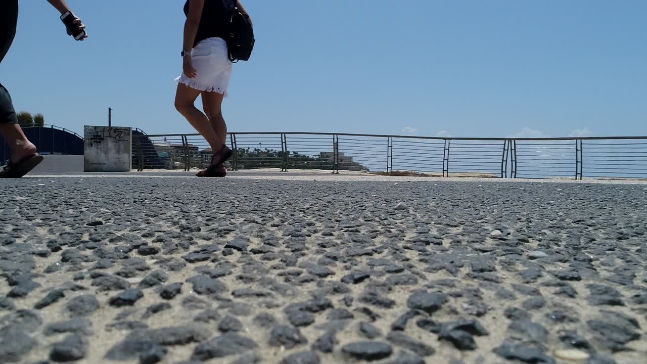 People Walking Along Coastal Path