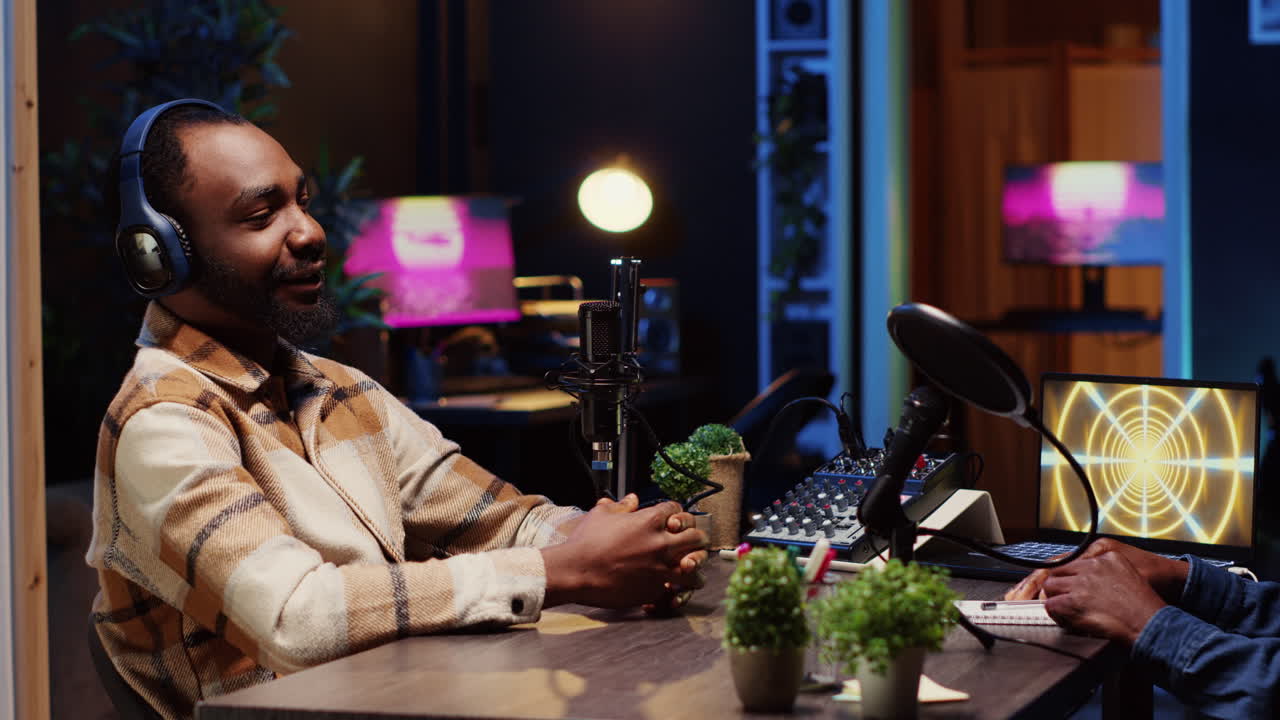 Man hosting podcast, using professional audio equipment to ensure high sound quality