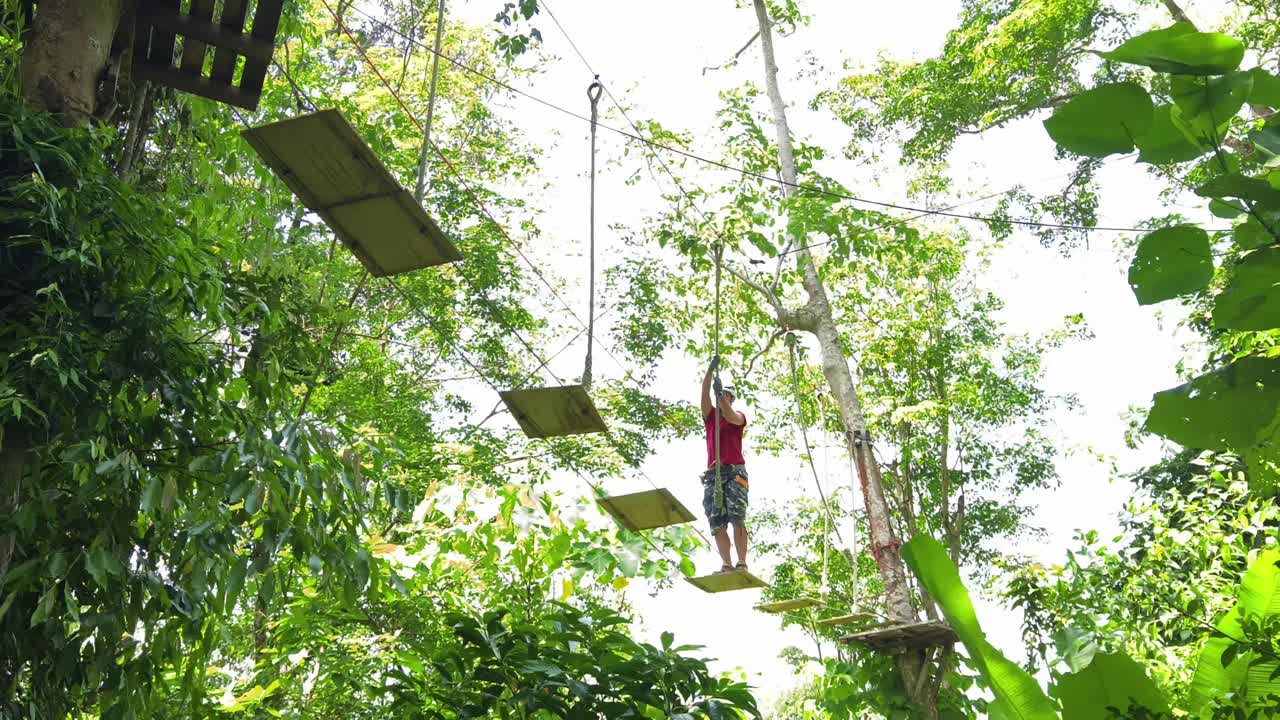 Person on Treetop Adventure Zipline
