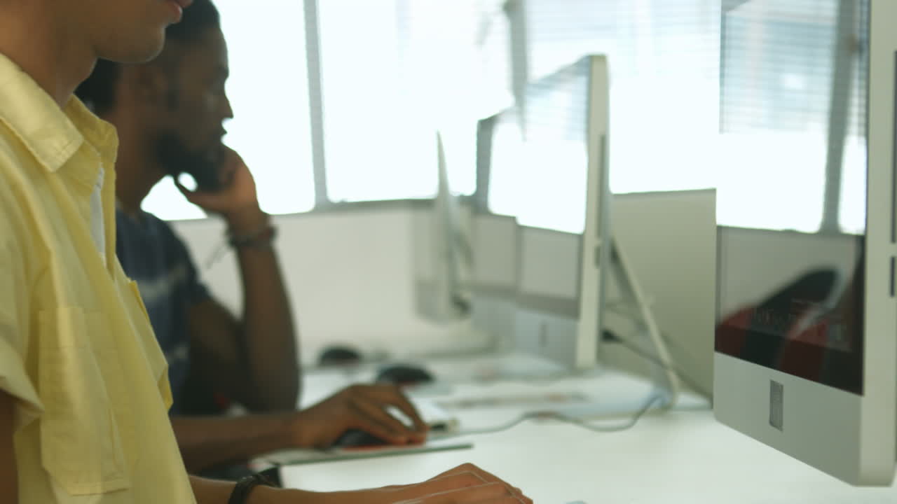 Students using computer in classrooms
