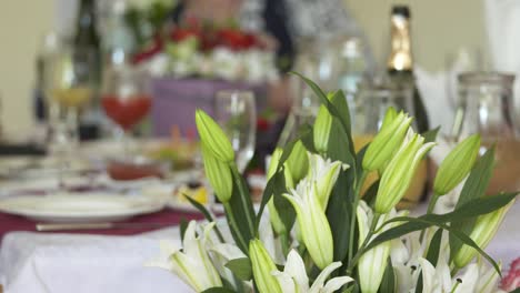 people enjoy appetizers and beverages at festive dinner