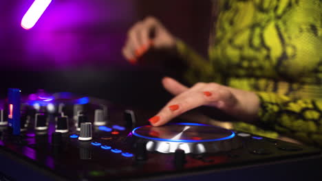 woman djing at the disco