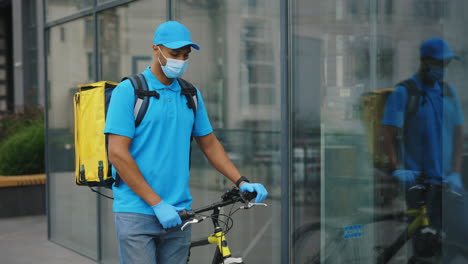 delivery person on bicycle