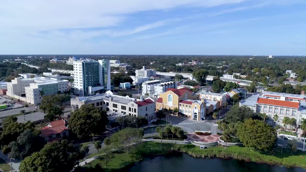 4K Aerial Video of Downtown St Petersburg, Florida Flying North over Mirror Lake