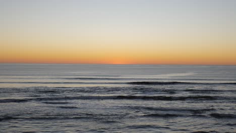 sun over the horizons with the ocean. beautiful beach sunset on coastline in california