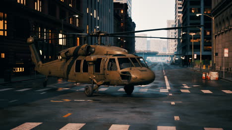 military helicopter landing in a city at night