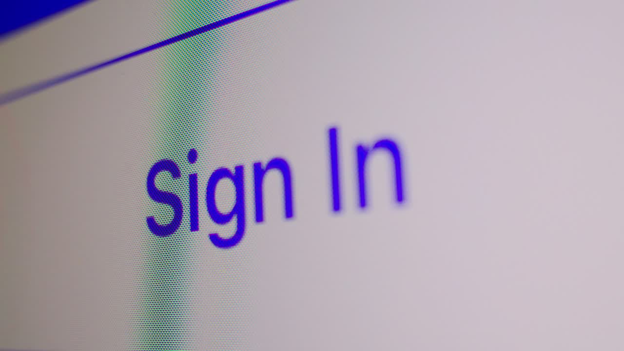 Finger Taps "Sign In" Button on Digital Screen