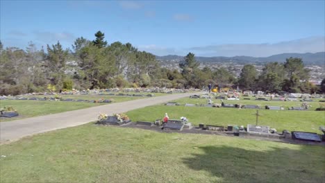 shot of cemetery and tombstone for funeral burial from covid 19 pandemic outbreak