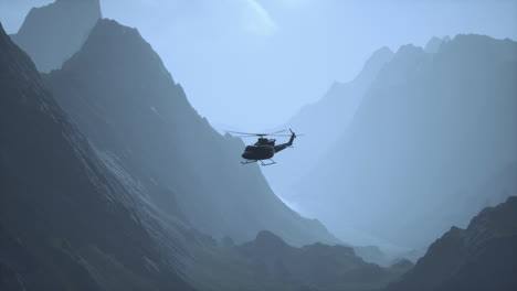 helicopter flying over mountains