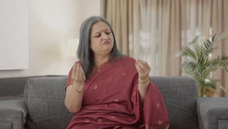 sick indian old woman suffering from hairfall