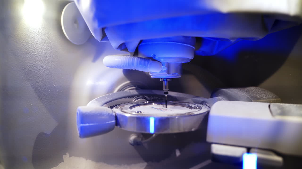 Close up of dentist working. Laboratory milling cutter for dental work