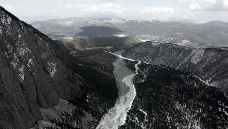 aerial: historical glacier riverbed valley in yulong, jade dragon mountain china