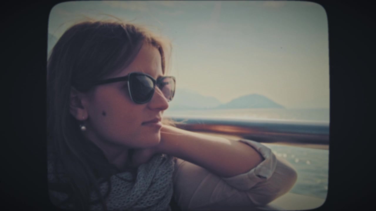 Woman with sunglasses riding on a boat