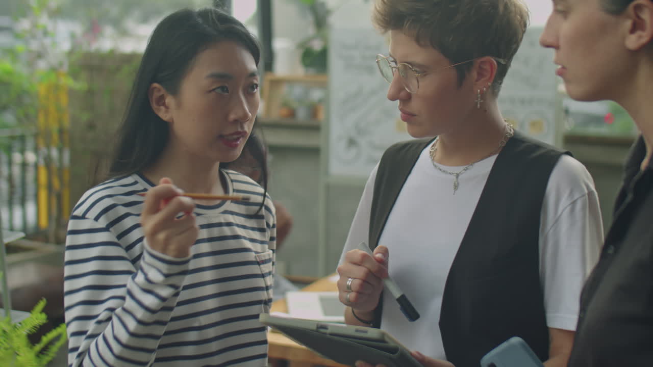 Business meeting between diverse colleagues