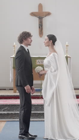 couple at wedding ceremony in church