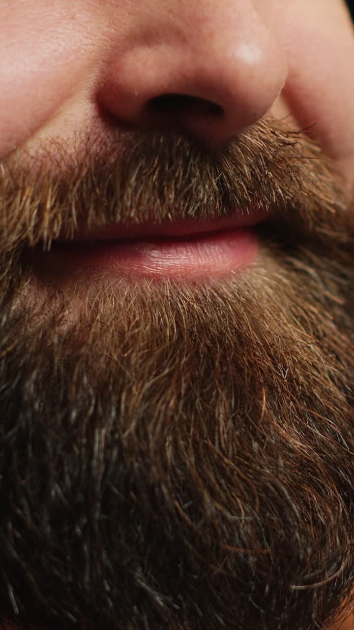 Close Up of Bearded Man's Mouth Moving While Talking