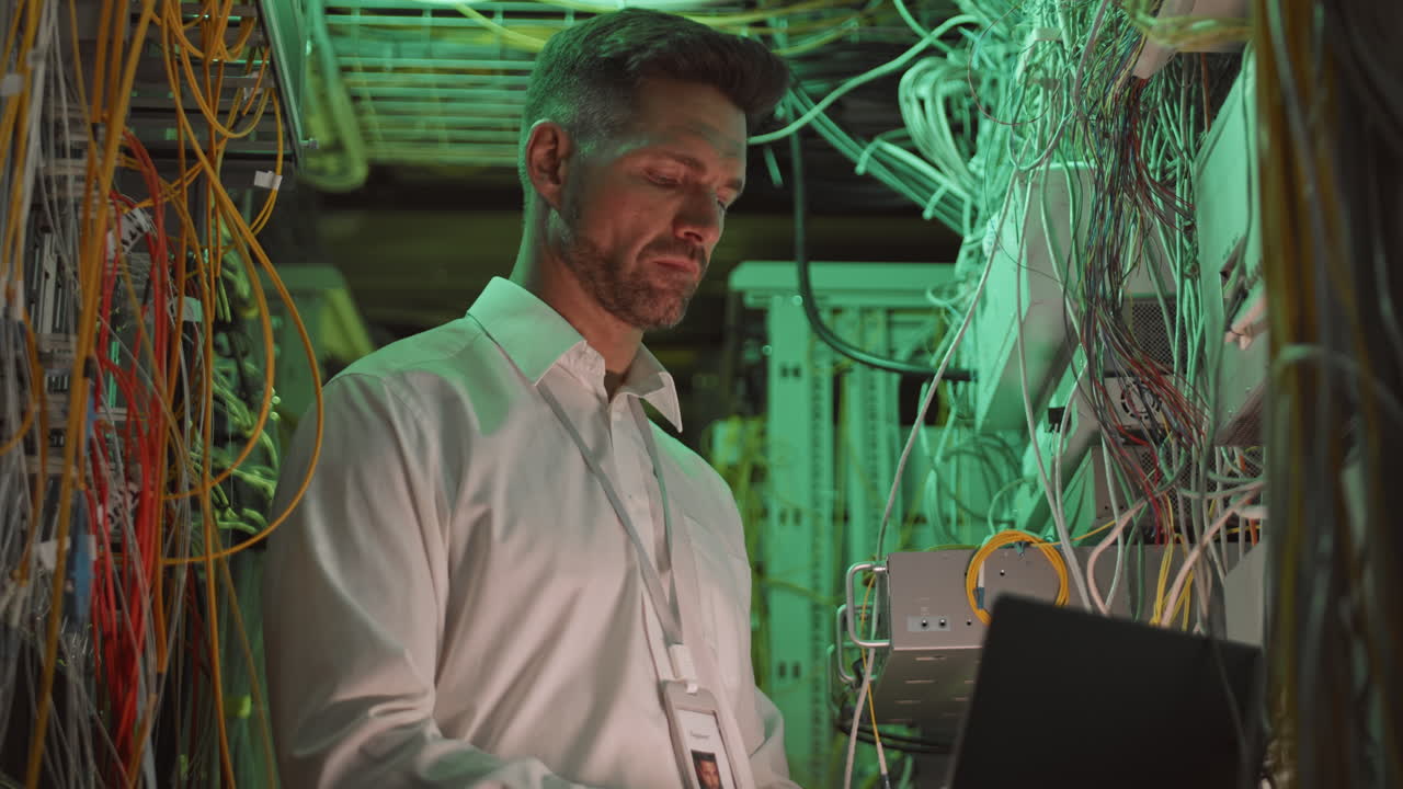 IT Engineer Working in Server Room