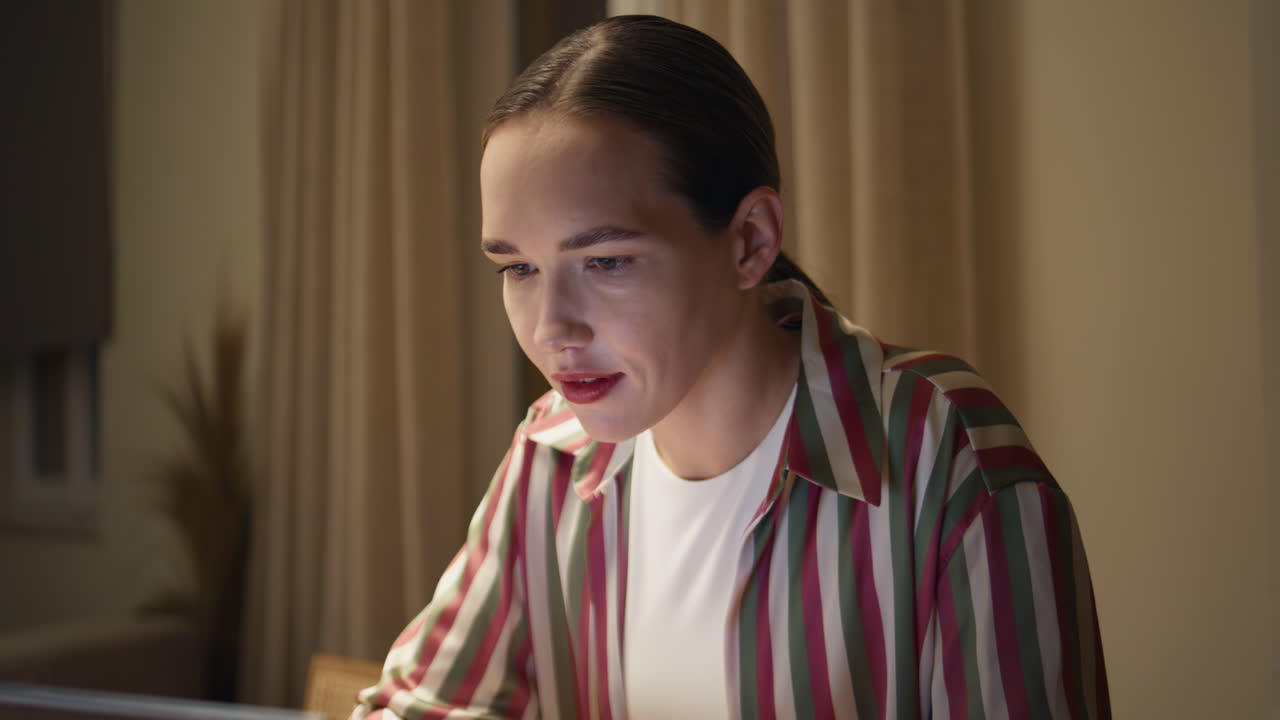 Remote businesswoman working computer in evening. Busy freelancer in home office