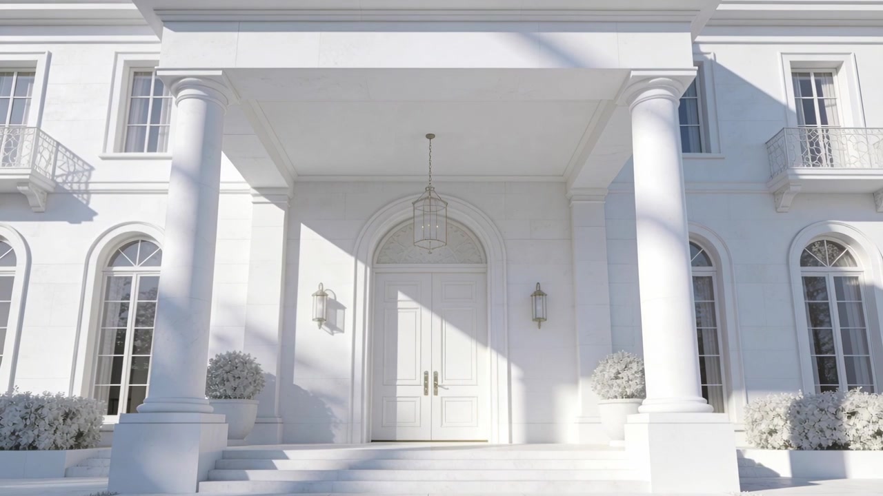 La telecamera si allontana rivelando l'ingresso principale con portico neoclassico, con la luce del sole che proietta un'ombra diagonale.