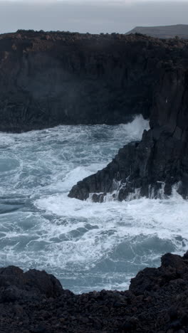 los hervideros in lanzarote, canary islands in vertical