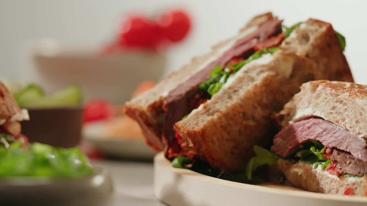 Delicious Steak Sandwiches on Wooden Tray