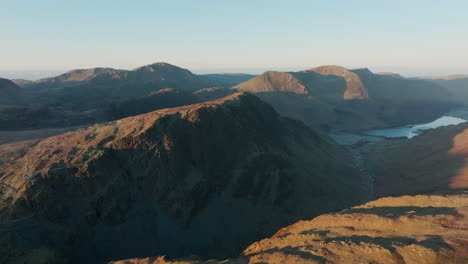 mountains and valleys at dawn with autumn sunshine