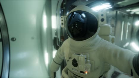 astronaut inside the orbital space station