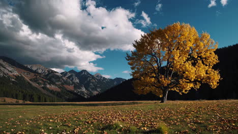 autumn mountain valley with golden tree