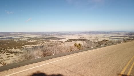 A-drive-down-a-windy-mountain-road-with-amazing-views-in-New-Mexico