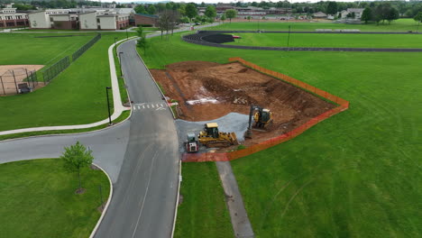 aerial flyover and tilt down of excavation area