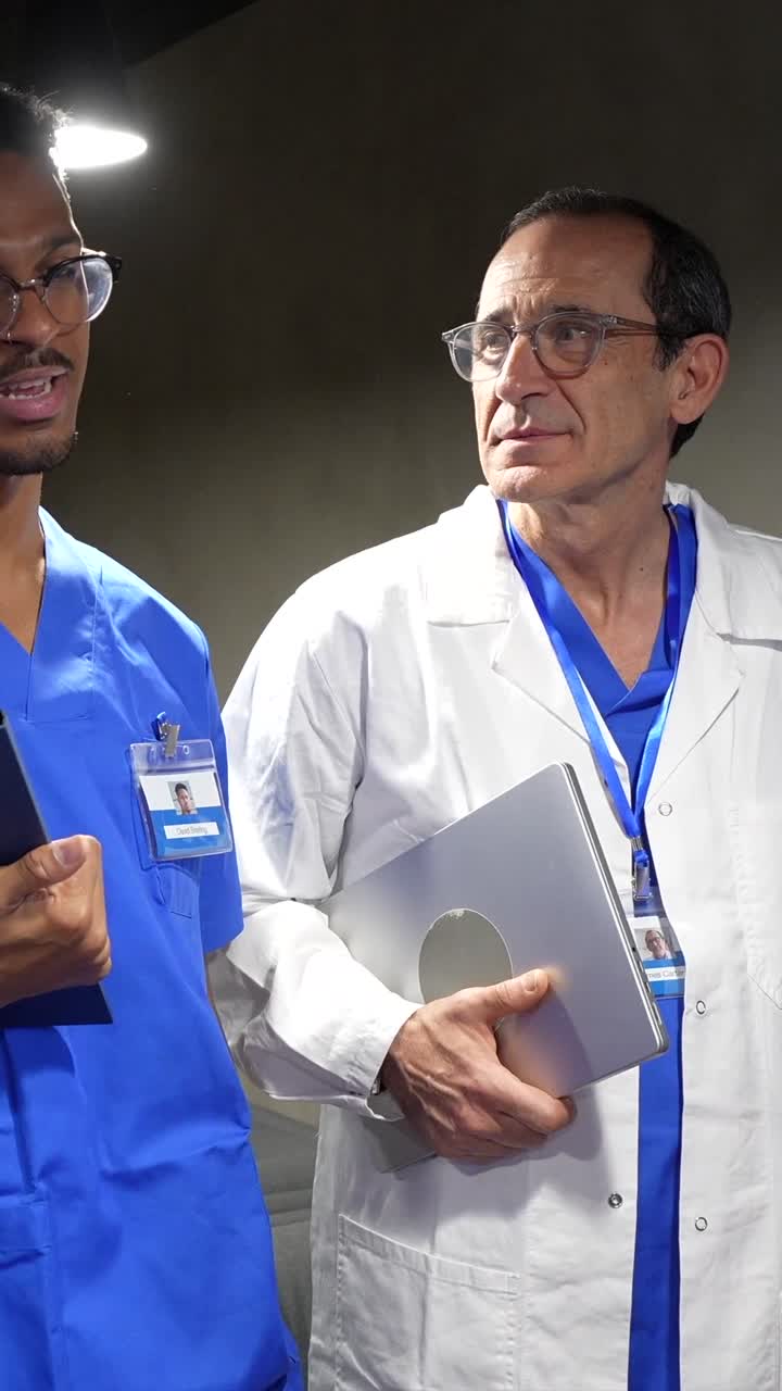 Medical Professionals Discussing and Clapping in a Hospital