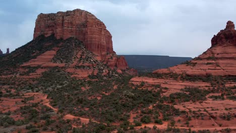 Drone-shot-revealing-the-wild-landscape-of-the-most-popular-tourist-attraction-site-Bell-Mountain-red-rock,-Arizona