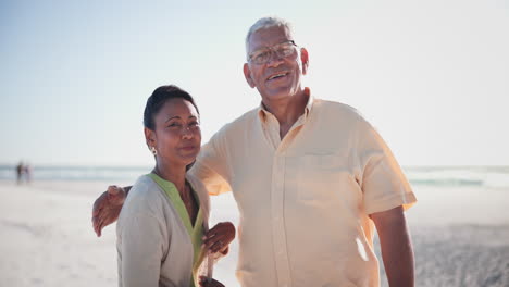 Elderly-man,-woman-and-face-on-beach-hug-for-ocean