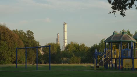 establishing shot of chemical refinery plant in pasadena, texas community