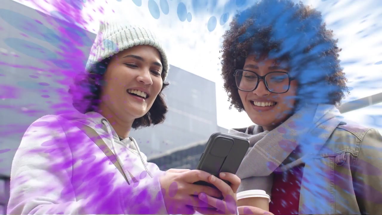 Left woman tapping phone, friend holding coffee, sharing social post, purple splash expanding
