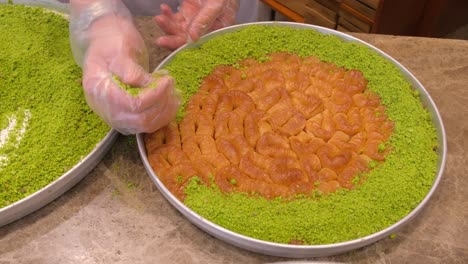 delicious turkish baklava covered with ground pistachios, turkey