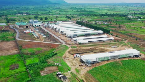 premium poultry farm in rural kuje, nigeria - pullback aerial view