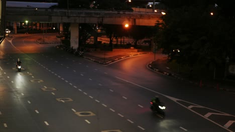 road and traffic in front of central ladprao is the shopping mall of north bangkok thailand with a new bts station in covid-19 situation at night.