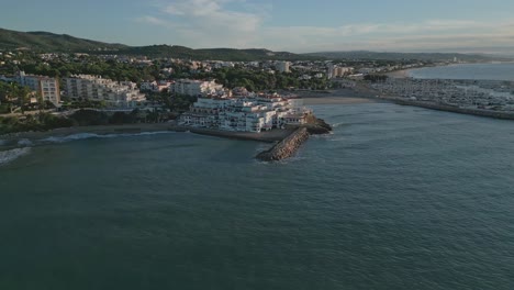 Roc-de-Sant-Gaietà-village,-Costa-Dorada,-near-Tarragona-in-Spain,-with-marina-and-coastline,-aerial-view