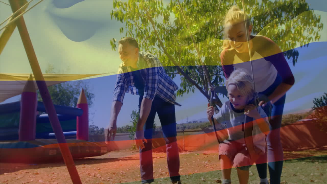 animación de la bandera de colombia sobre la familia caucásica en el patio de recreo