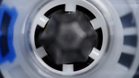 close-up of a cassette tape mechanism