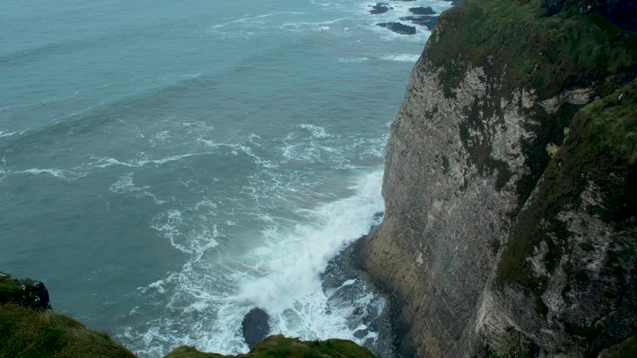 Moody footage from Ireland’s famous coastal route, showing rugged cliffs and turbulent waters
