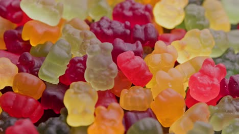 full frame looped spinning background of colorful jelly bear candies