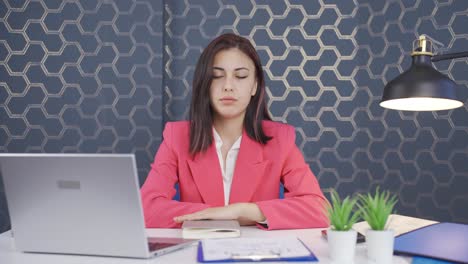 Unsuccessful-young-business-woman.-She-looks-at-the-camera-negatively.