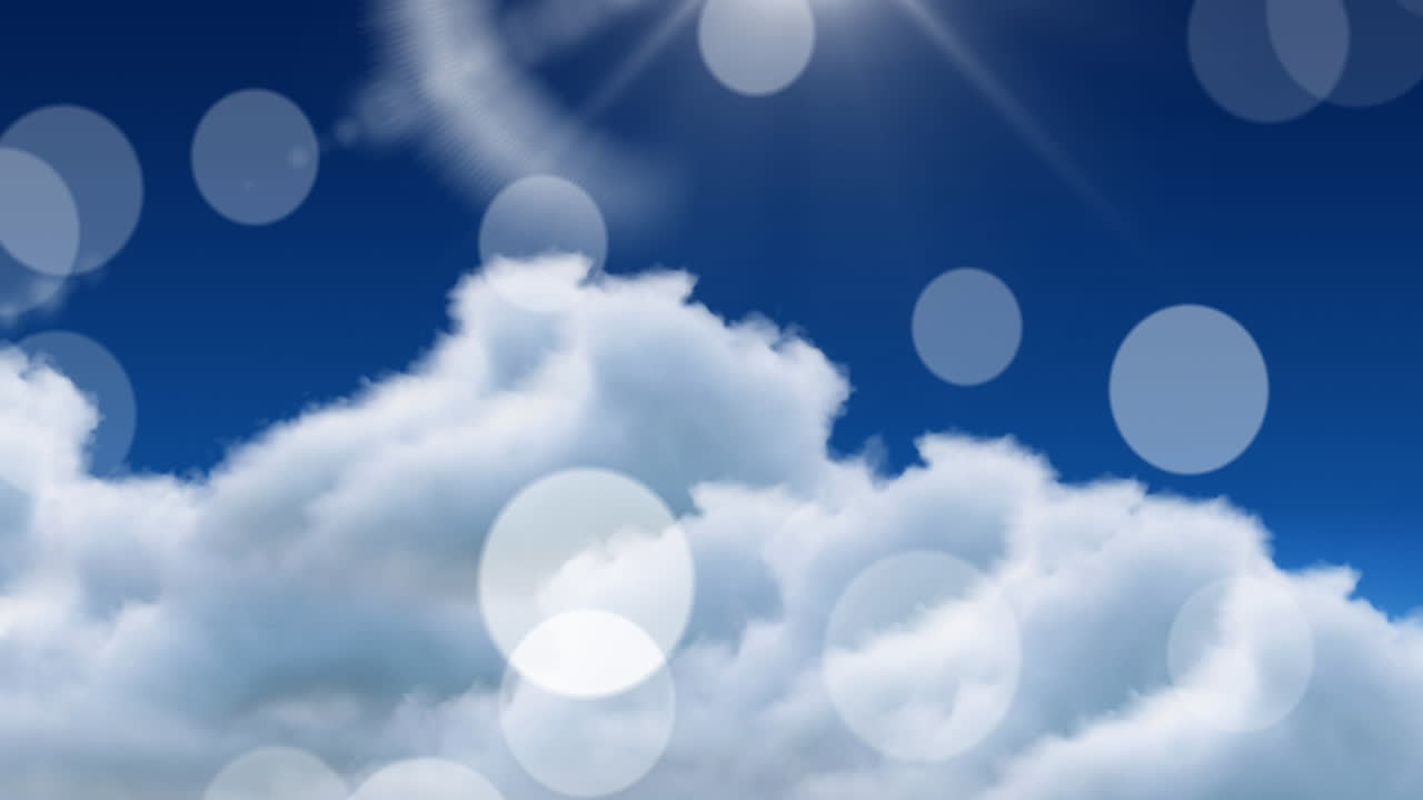 파란 하늘에 구름 위에 떨어지는 빛의 반점의 애니메이션