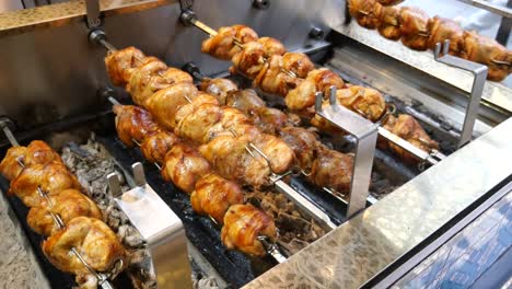 roasted chicken on a rotisserie